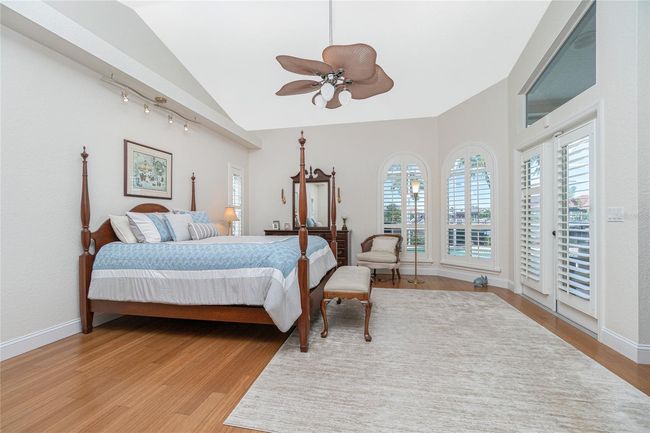 French doors to the pool with plantation shutters | Image 37