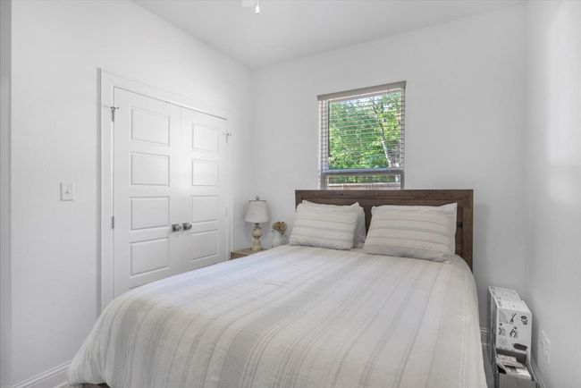 Bedroom with a closet | Image 24