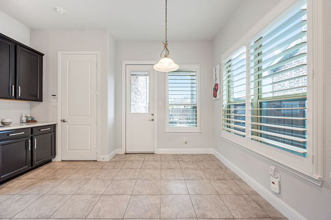 Kitchen dining area with coffee bar | Image 14