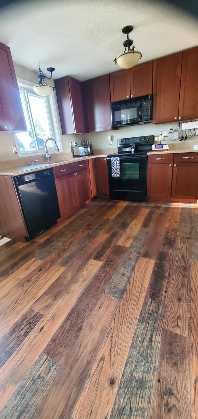 kitchen with new flooring | Image 20