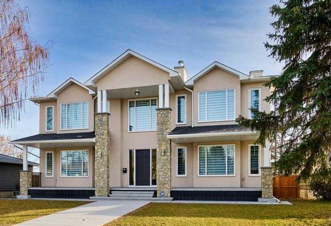 54 Malibou Road Sw, Home with 5 bedrooms, 3 bathrooms and 3 parking in Calgary AB | Image 2