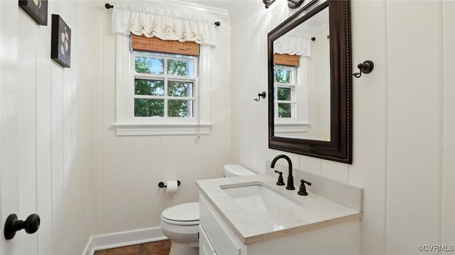 Bathroom with crown molding and vanity | Image 29