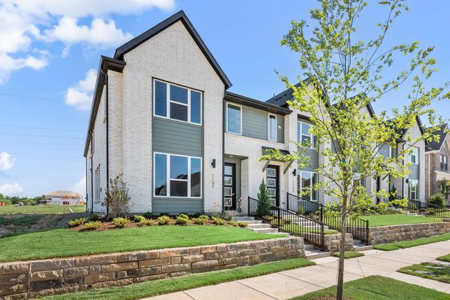 Featuring white brick with a contemporary trim, this dream home offers fantastic curb appeal! | Image 4