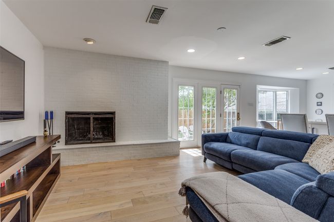 Wood burning fireplace with gas starter. | Image 13