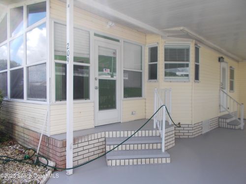 209 Kiwi Dr, Barefoot Bay, FL, 32976-2412 | Card Image