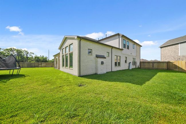 Fully fenced oversized lot offers privacy and endless possibilities. | Image 40