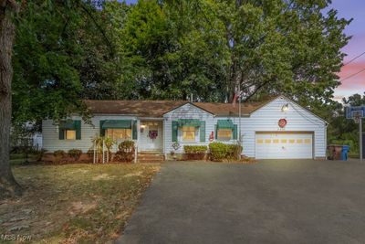 Ranch-style house with a garage | Image 1