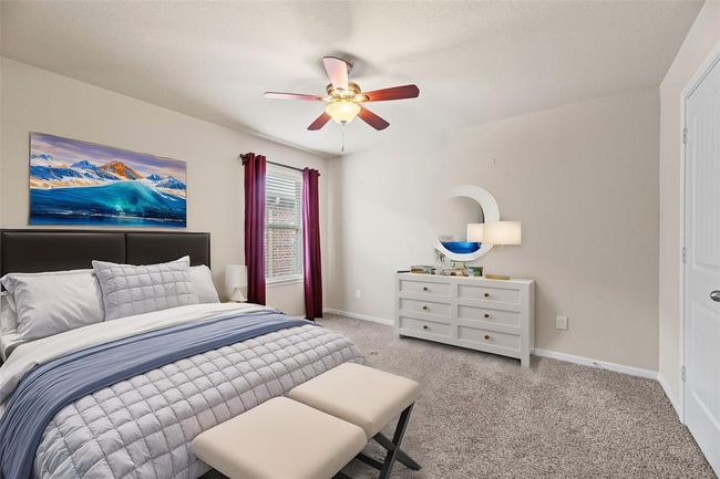 Your second bedroom offers a generous and inviting space that exudes comfort and versatility. | Image 17