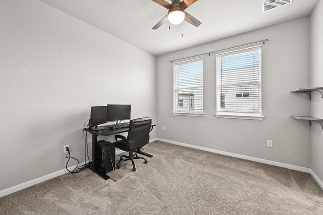 Each guest bedroom features thoughtful details and plenty of room to make your guests feel right at home, with easy access to the full bath nearby | Image 23