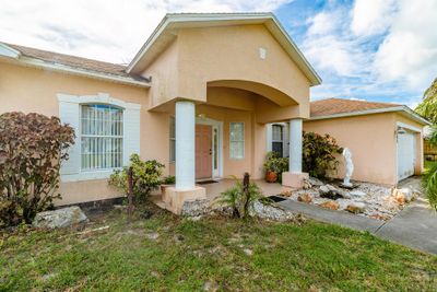 2343 Sw Mountwell Street, House other with 4 bedrooms, 2 bathrooms and null parking in Port St Lucie FL | Image 2