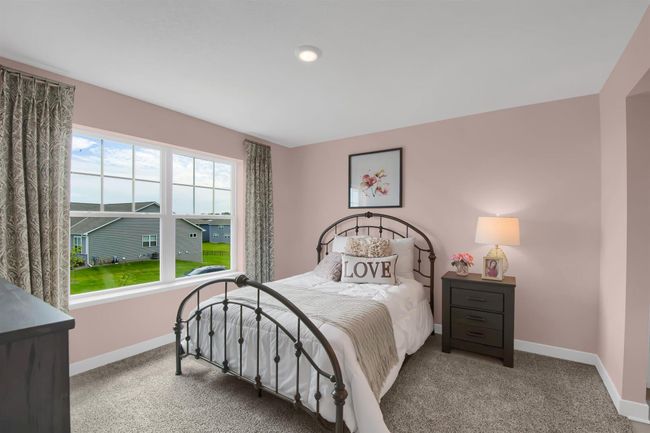 The additional upper level bedrooms are spacious and have their own walk in closets! Model photos. Options and colors will vary. | Image 27
