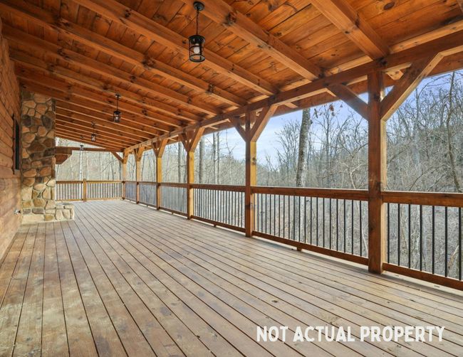 Covered 12' Deck with Stone Fireplace | Image 7