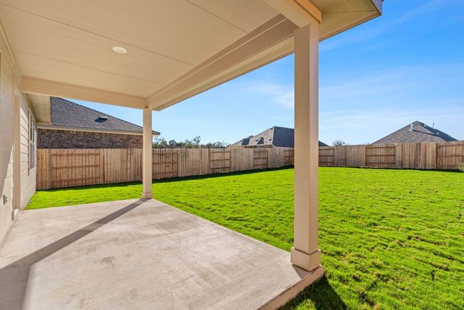 View of yard with a patio and a fenced backyard | Image 24