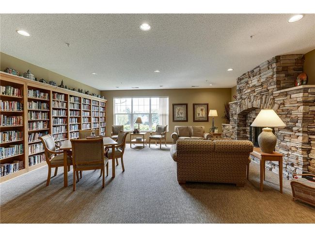 A beloved library, anchored by a cozy FP and filled with hundreds of ever-growing books, offers a quiet retreat for reading or conversation - and transforms into a lively gathering space for Sunday evening wine and appetizers. | Image 24