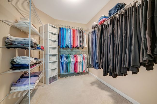 Take a look at this walk-in closet in the primary bedroom! | Image 35