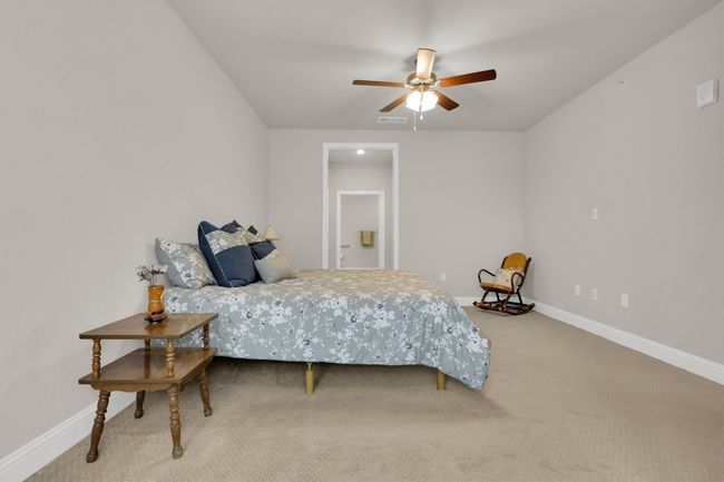 Master Bedroom with carpet floors, baseboards, and a ceiling fan | Image 20