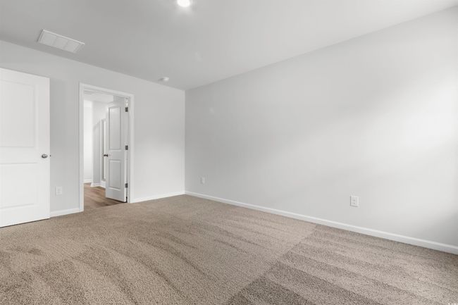 View of carpeted spare room | Image 29