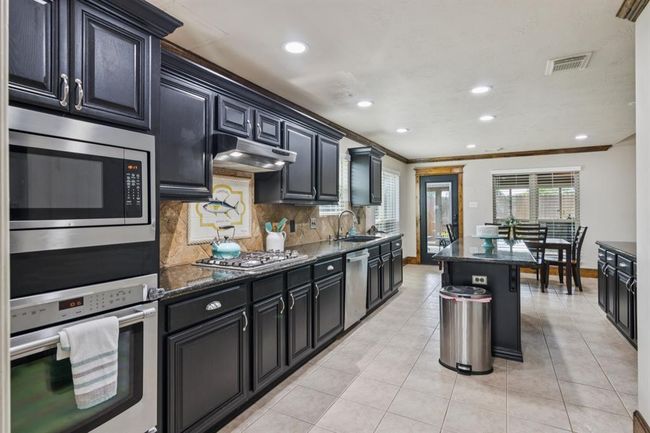 This kitchen is a dream. So much space. Gas cooktop, but could be converted to electric. | Image 11