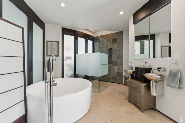 Full bath with a stall shower, recessed lighting, a soaking tub, and a sink | Image 18