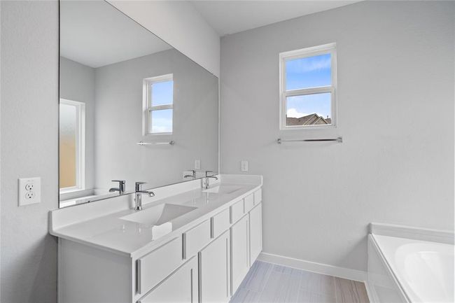 This photo is for illustrative purposes only and is not to be considered an exact replica of the finished home. Rendering does not match the finished product in terms of features, colors, landscaping, etc. Pricing, specifications, square footage and materials are subject to change at any time and without notice. | Image 7