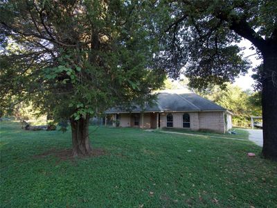 Ranch-style house with a front lawn | Image 3