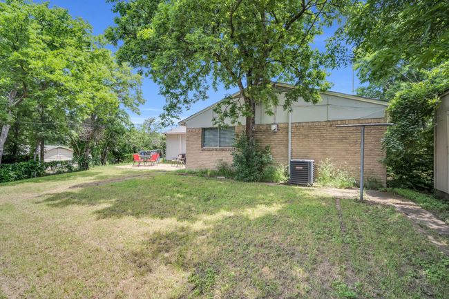 View of yard featuring central AC unit and a patio | Image 32