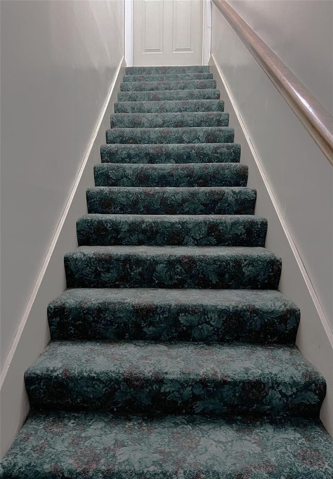 Follow the staircase to 2 bedrooms and another bathroom. | Image 39