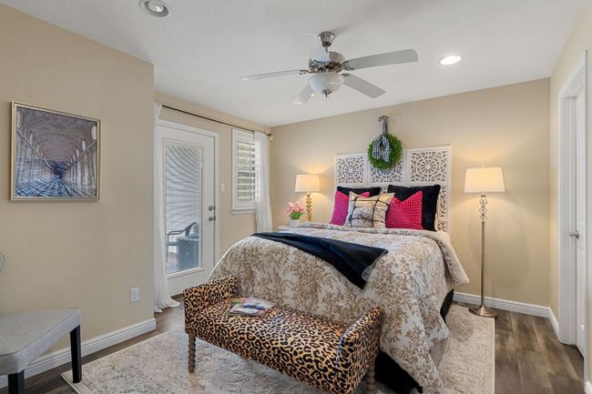 1st Floor Bedroom #3 with a ceiling fan, baseboards, wood finished floors, and recessed lighting | Image 31