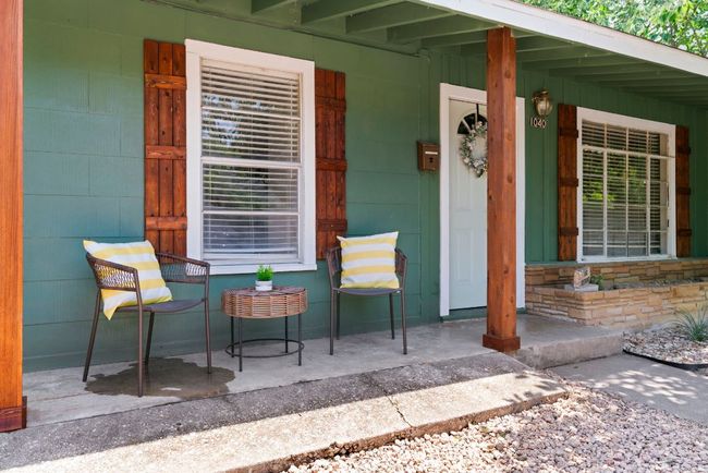 The front yard is sizeable and perfect for sitting out and waving to passing neighbors. | Image 19