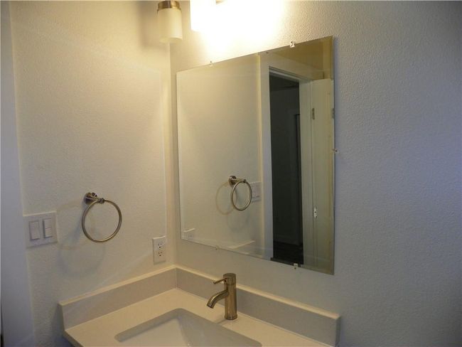 Bathroom featuring vanity | Image 16