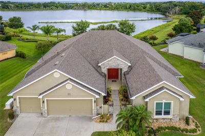 8065 Bridgeport Bay Circle, House other with 4 bedrooms, 2 bathrooms and null parking in MOUNT DORA FL | Image 1