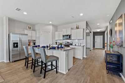 Kitchen - All Home and community information, including pricing, included features, terms, availability and amenities, are subject to change at any time without notice or obligation. All Drawings, pictures, photographs, video, square footages, floor plans, elevations, features, colors and sizes are approximate for illustration purposes only and will vary from the homes as built. | Image 2