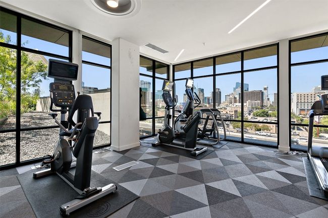 24-Hour Fitness Center with Skyline Views | Image 31