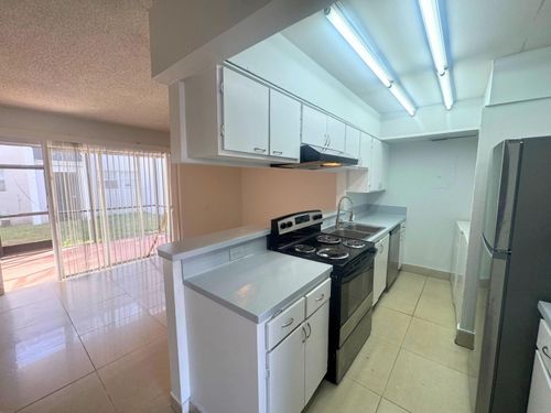 21c-4423 Treehouse Ln, Tamarac, FL, 33319-3381 | Card Image