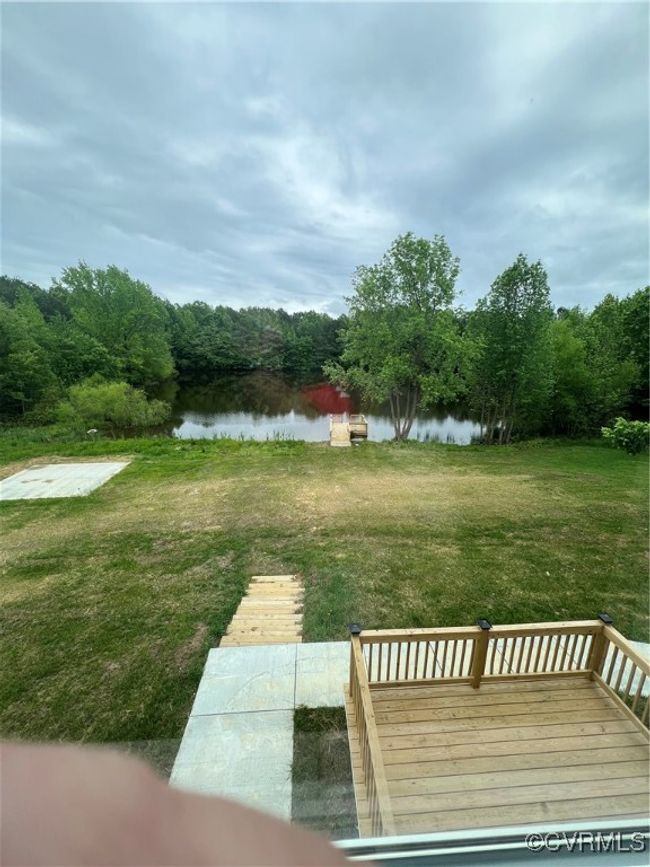 View of yard featuring a water view and a view of trees | Image 15