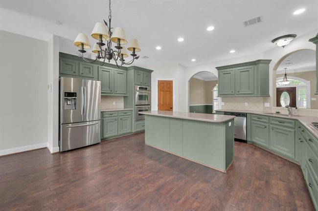 Breakfast area. Double oven next to the Pantry. Refrigerator included. | Image 16