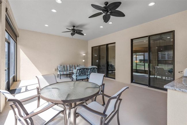Extended Under Roof Screened Lanai for your outdoor enjoyment and entertaining | Image 31