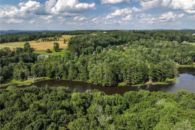 Aerial view featuring a water view | Image 5