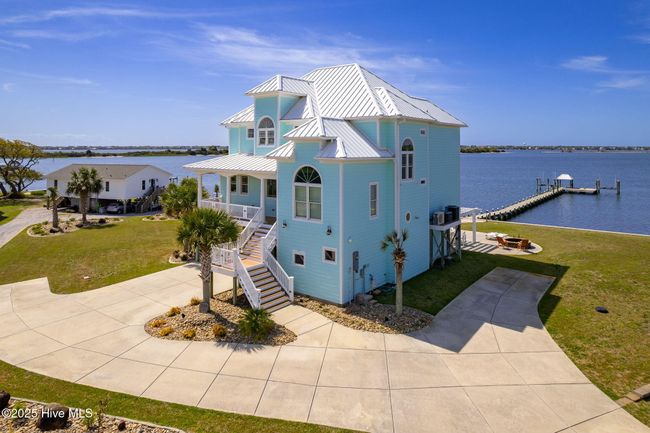 with private dock, boat trailer parking, and covered carport | Image 70