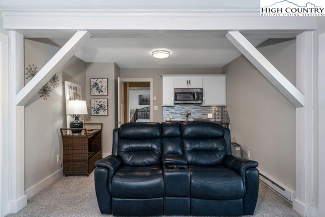 Family room with 2 guest rooms. | Image 19