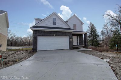 8750 Oak Ridge Trail, Home with 4 bedrooms, 2 bathrooms and null parking in Westland MI | Image 1