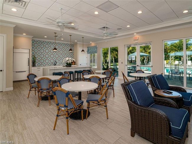 Dining room with ceiling fan, light hardwood / wood-style flooring, and ornamental molding | Image 26
