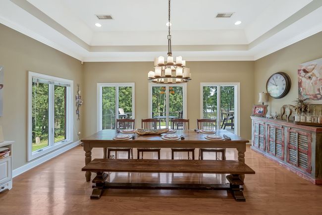 Huge eat in area adjacent to kitchen provides ample space for a large table and large gatherings. Tons of natural light! | Image 16