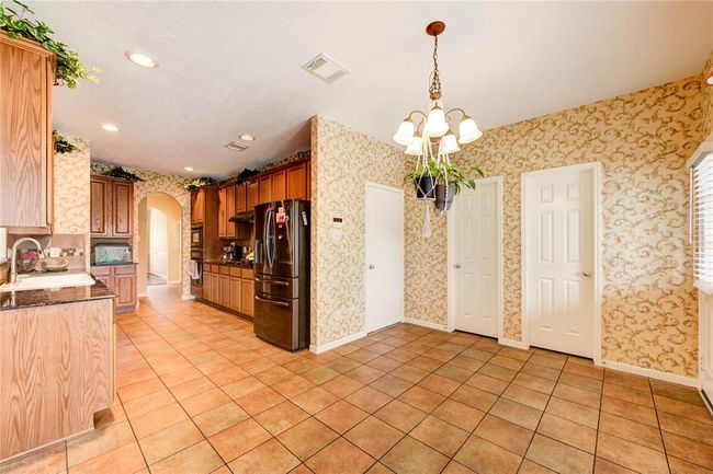 Breakfast nook and kitchen | Image 17