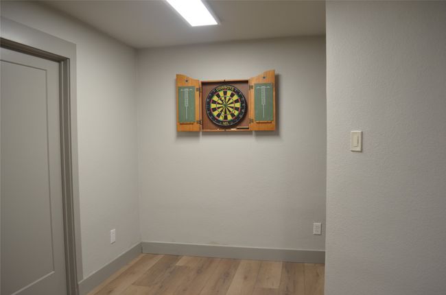Additional area in walkout basement. More storage to right of photo and door on left side of photo leads to huge storage space and Hvac and tech equipment | Image 32