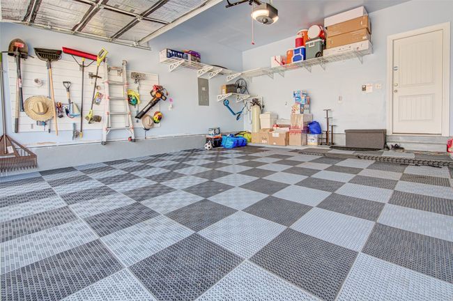 Insulated Garage with sturdy floor tiles, SafeRacks, Chamberlin Garage Door Opener (WiFi & MyQ App enabled), Garage Closet, EV Charge Outlet 220V | Image 34