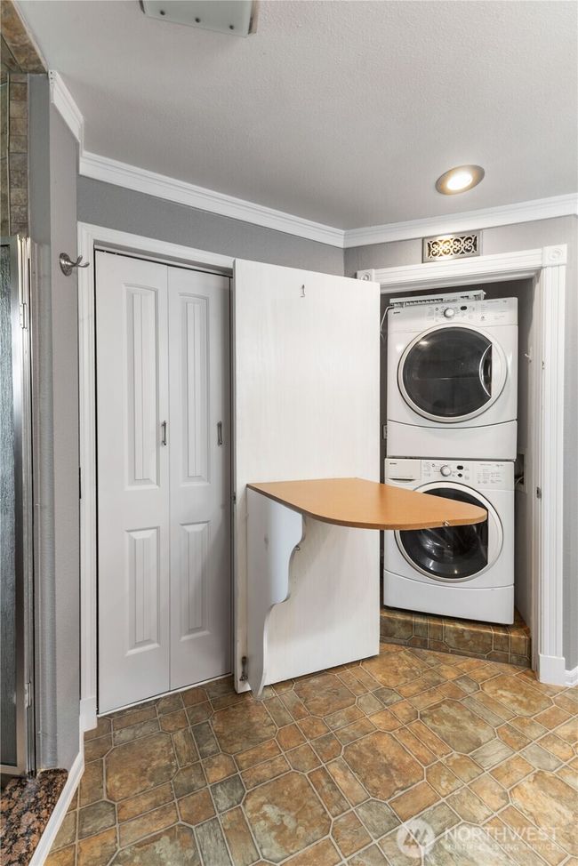 Upstairs utility with folding board | Image 10