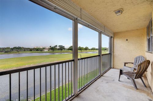 303-3100 W Rolling Hills Cir, Davie, FL, 33328-1927 | Card Image