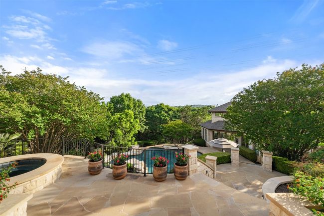 View of patio with an in-ground hot tub | Image 32