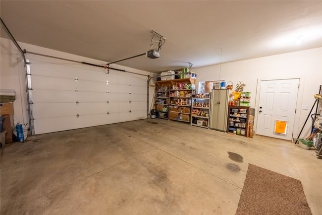 Garage featuring a garage door opener | Image 18